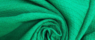 Ткань матлассе зеленого цвета